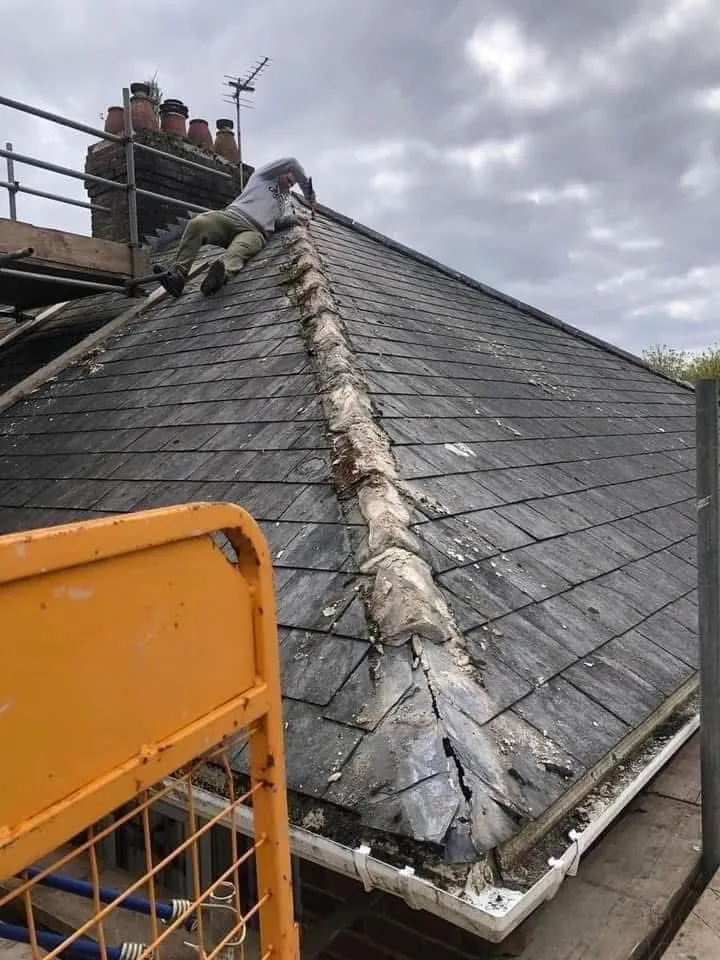 Slate roof ridge and chimney repair in Torquay